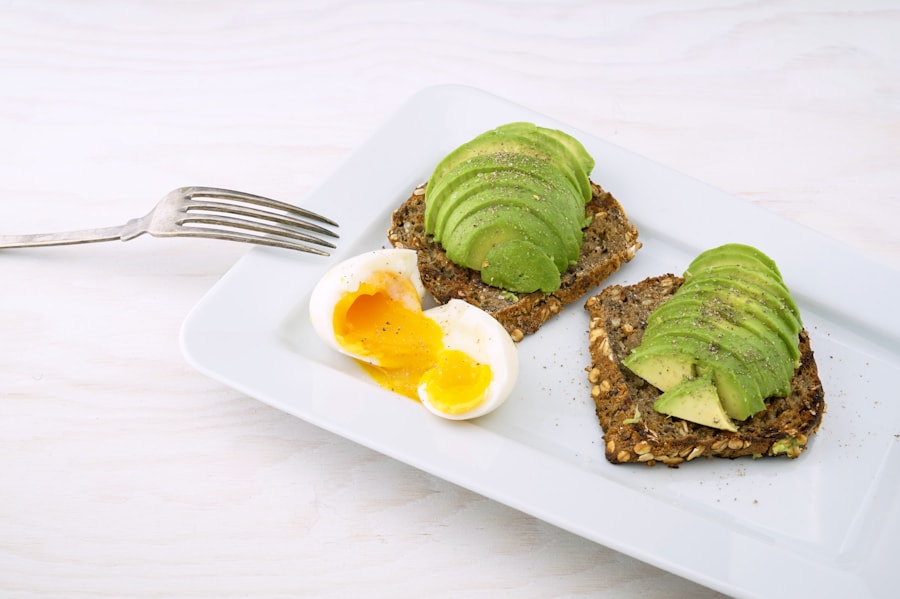 Avocado toast topped with tomatoes and fresh greens